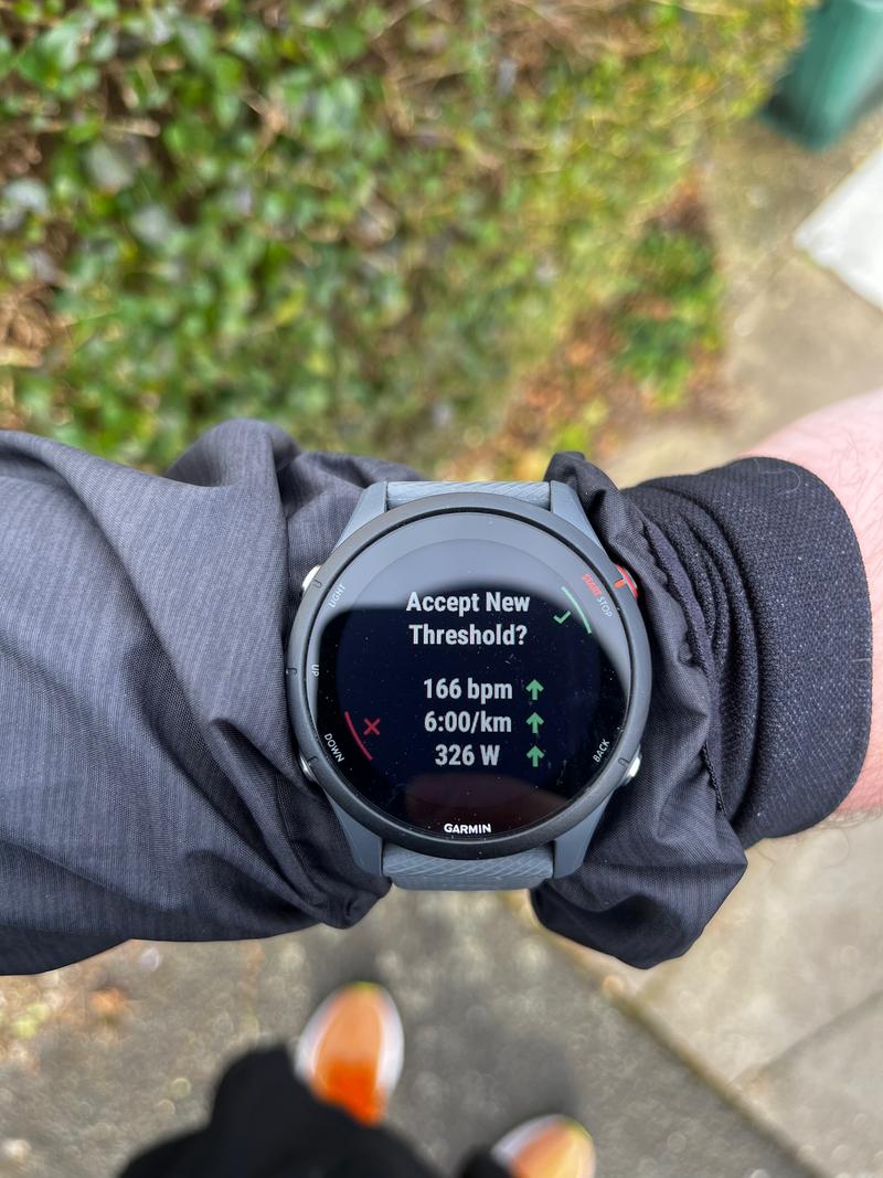 Picture of a Garmin watch showing an improvement on the threshold mark.